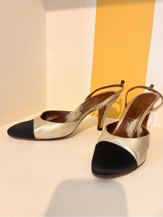 CHANEL Shoes - CHANEL Gold Leather Slingback Pumps with Black Cap Toe